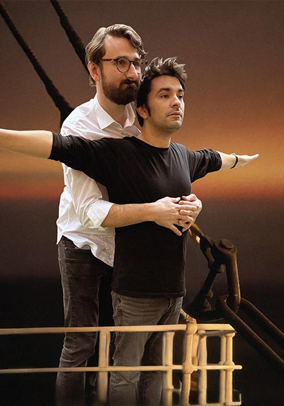 Iconic Titanic pose on the boat with arms outstretched by the host duo.