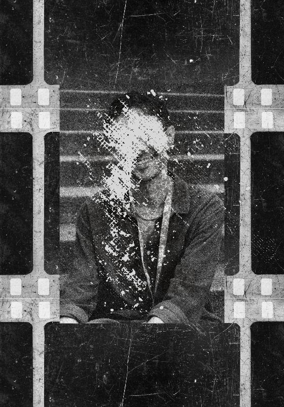 old film with a person on it with their face scratched out