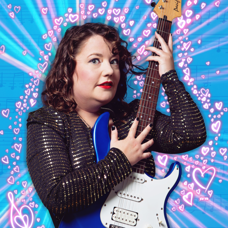 Person in a sequin jacket playing a white electric guitar with musical notes and hearts background.