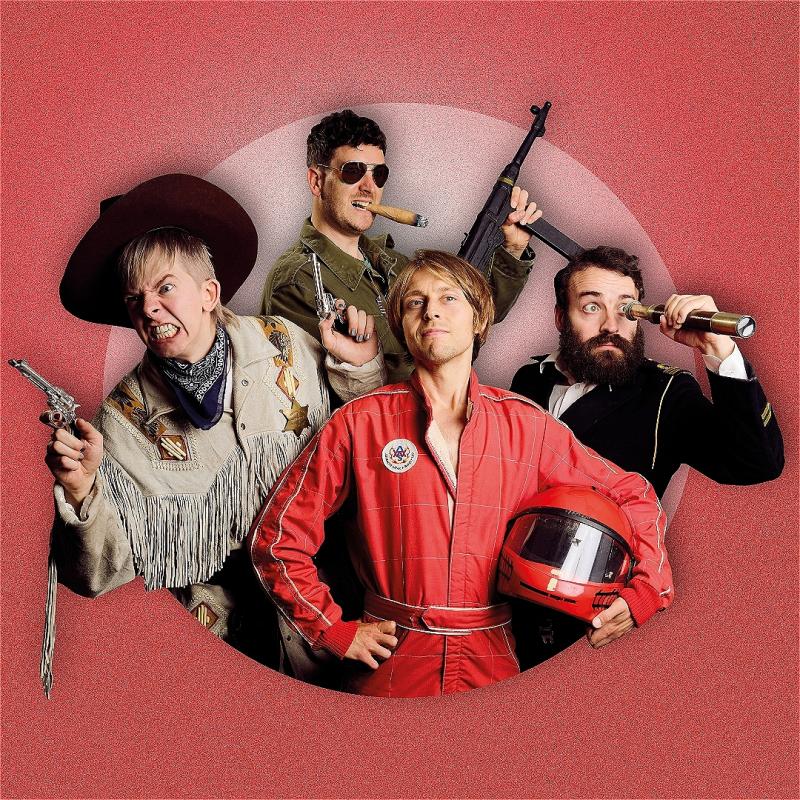 Four people stand in a circle. One is wearing a red motorbike suit, one is a cowboy with a gun, one is in an aviators jumpsuit, glasses and has a rifle, and the fourth is a sea captain with a telescope to their eye. 